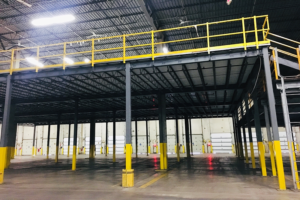 Photo of a Mezzanine installed in an open warehouse.